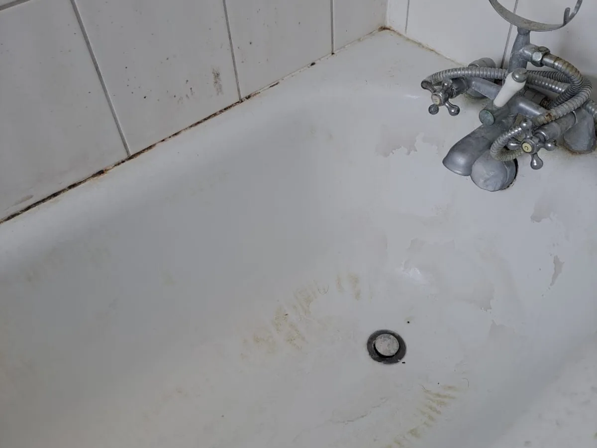 Stained bath before a deep clean